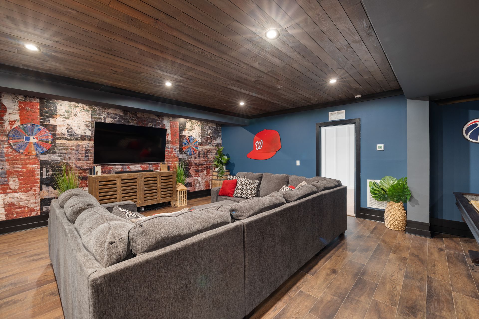 Finished lower-level living room with comfortable seating